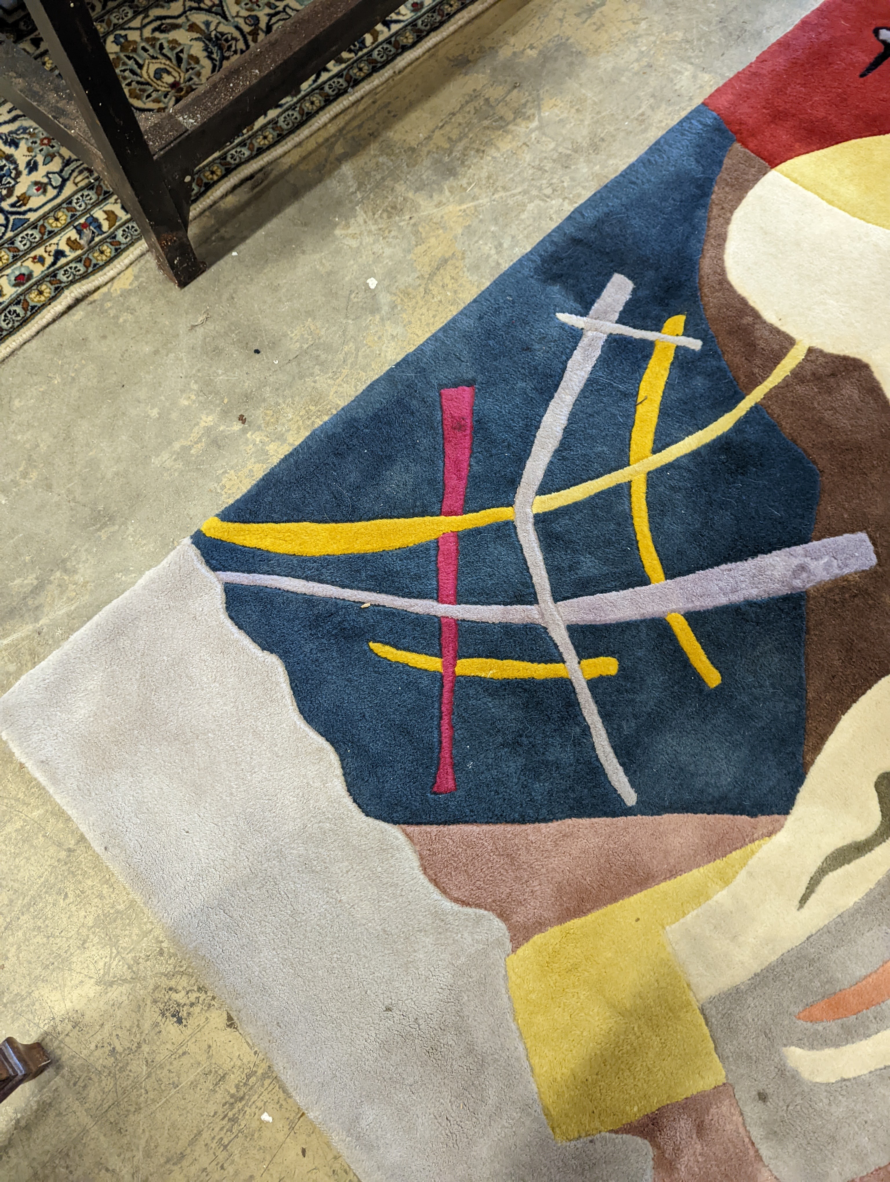 A contemporary Picasso inspired polychrome abstract pattern rug, 246 x 160cm